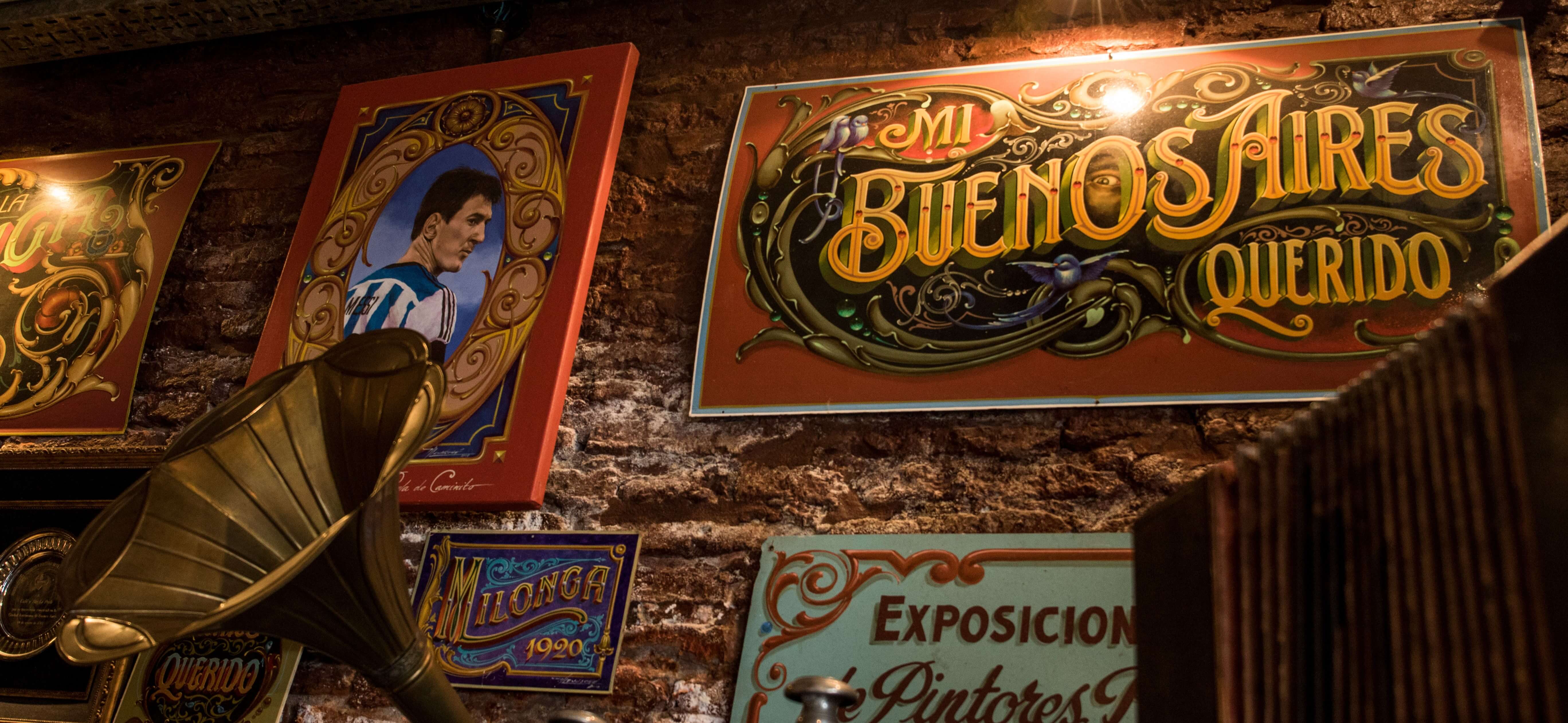 Signs for Buenos Aires on a wall