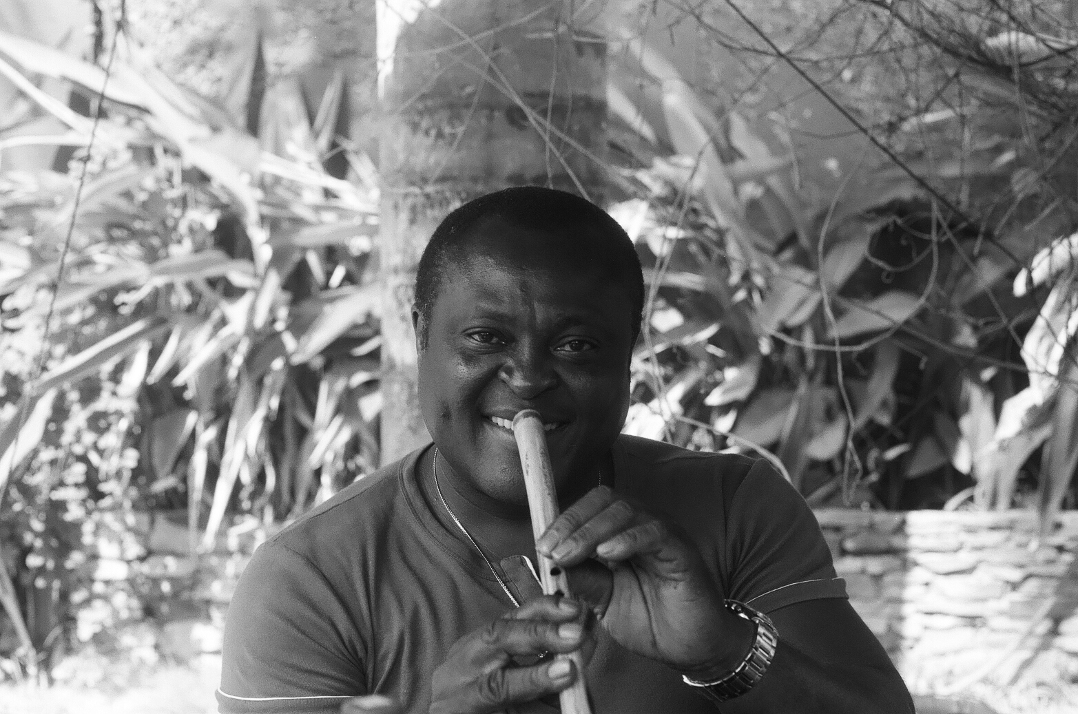 a man playing a cultural instrument