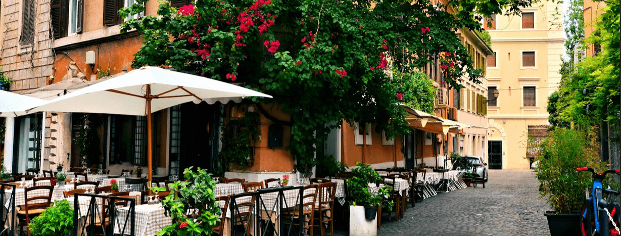 cafe with outdoor seating and bougainvillea on the overhang