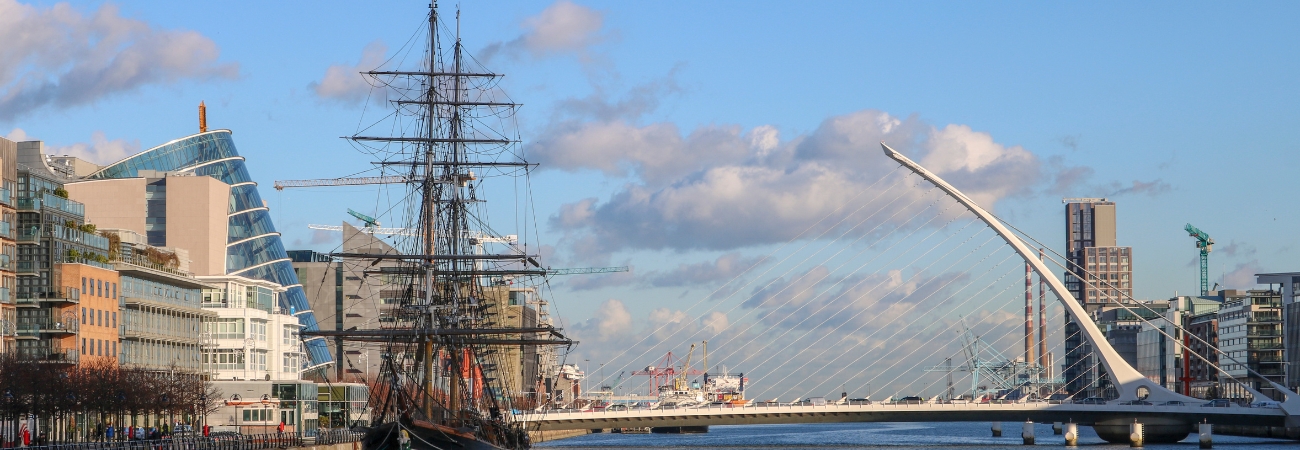 rooftop view of the City of Florence, with flat red roofs and the Duomo