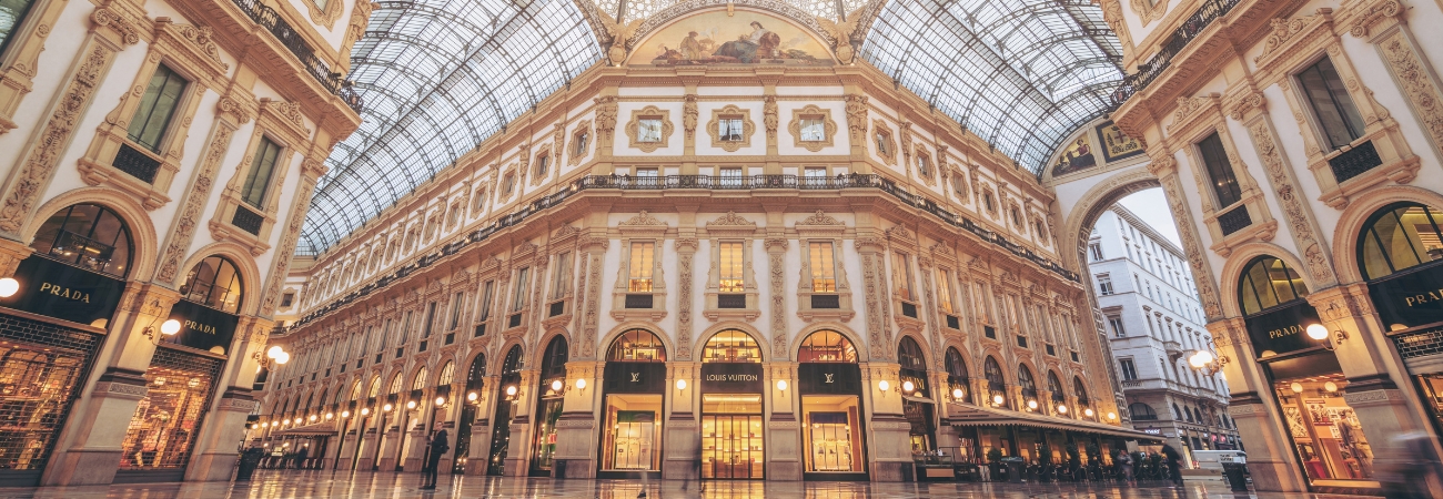 rooftop view of the City of Florence, with flat red roofs and the Duomo